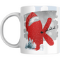 Christmas Mug with Letter K & Santa Print featuring red glitter-style K, Santa sleigh silhouette, snowman, and pine trees on white ceramic.