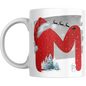 Christmas Mug with Letter M & Santa Print features a red glitter-style M with Santa sleigh, snowman, and winter trees. Perfect festive drinkware gift.