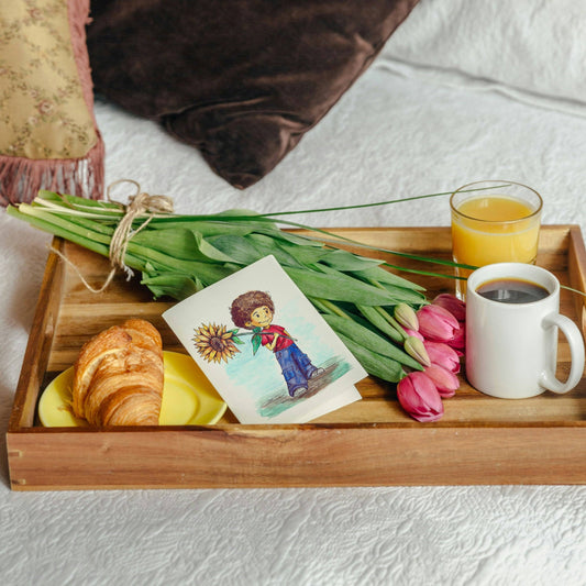 Sunflower Boy Greeting Card - Hand Painted | Watercolor Print displayed on a wooden tray with tulips, croissant, and coffee. Ideal for gifting.